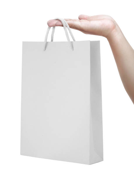 istock paper bag on human hands. isolated on a white background 1397557657