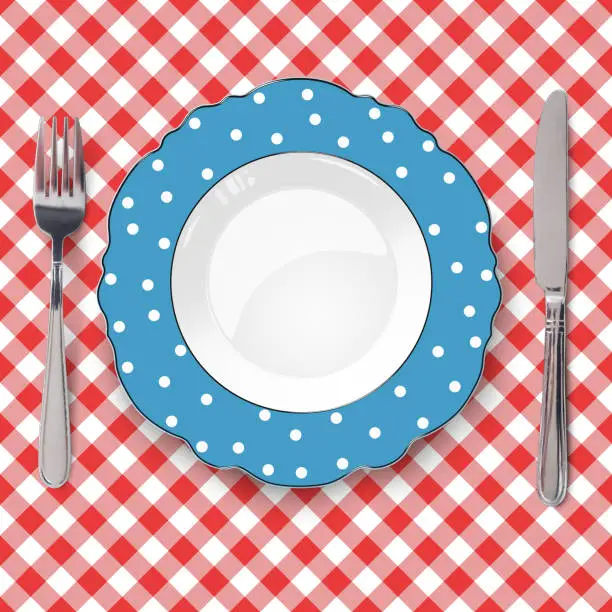 Vector illustration of Dark blue plate with figured edges and polka dot pattern placed on red check classic seamless tablecloth. Closeup view from above.