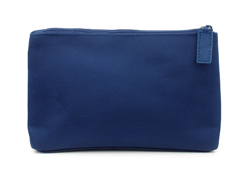 Side view of blue toiletry bag isolated on white