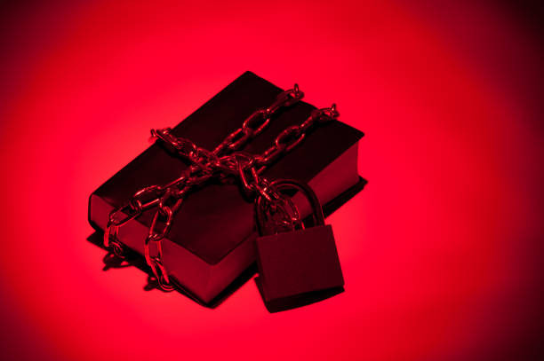 the symbolic book of all knowledge closed by a chain and padlock