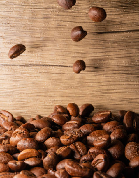 istock Coffee beans close-up wooden background 1397569842
