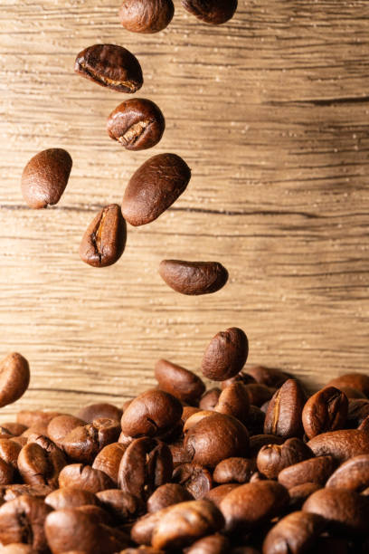istock Coffee beans close-up wooden background 1397569857