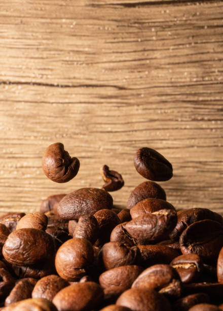 istock Coffee beans close-up wooden background 1397569862