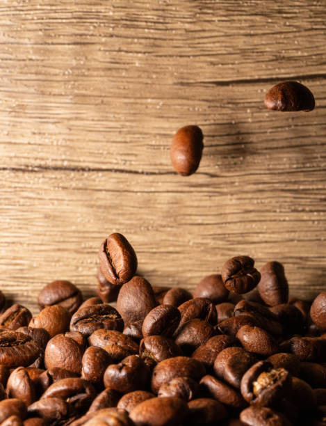 istock Coffee beans close-up wooden background 1397569869