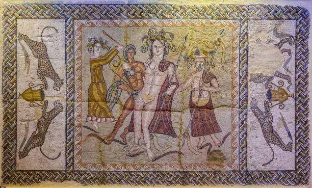 "n Mosaic of the Triclinium of the House of Bacchus. Mosaic representing the God Bacchus with part of his entourage, including a satyr on which the god is leaning. A scene flanked with figures of leopards facing a krater."nRoman city of Complutum (Alcala de Henares). 5th century AD."n"n"n alcala de henares stock pictures, royalty-free photos & images