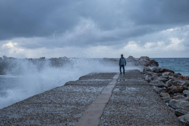 Sydney, Australia - April 27, 2024: A person enjoying the view of the ocean.