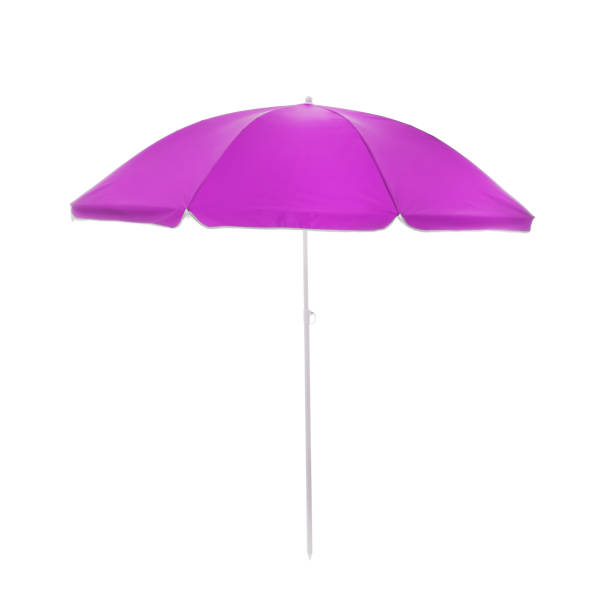 istock Open purple beach umbrella isolated on white 1397572178