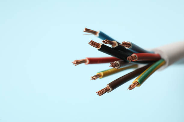 istock Many stripped electrical wires on light blue background, closeup 1397572905