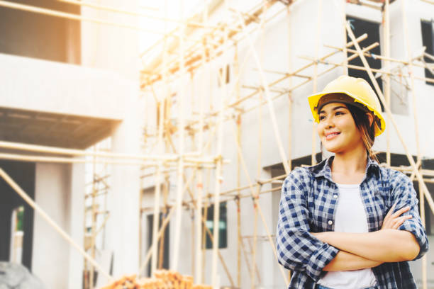 istock portrait of working women in construction site 1397579826