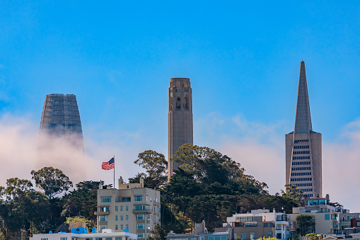 San Francisco city skyline with Karl the Fog rolling through the landmark towers