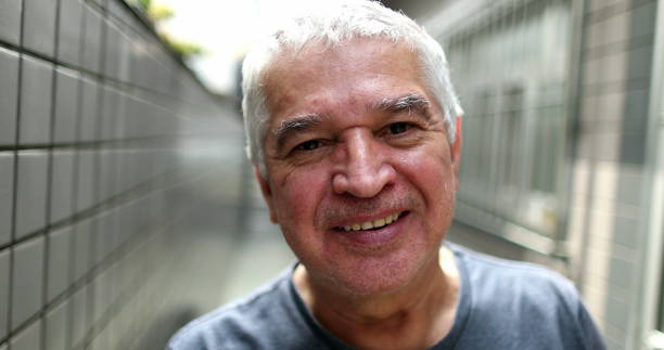 istock Older man portrait looking at camera, middle aged person staring camera 1397584861