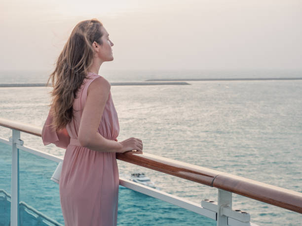 istock Beautiful woman standing on the empty deck 1397586232