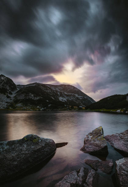 istock Lake in the mountains at sunset 1397586286