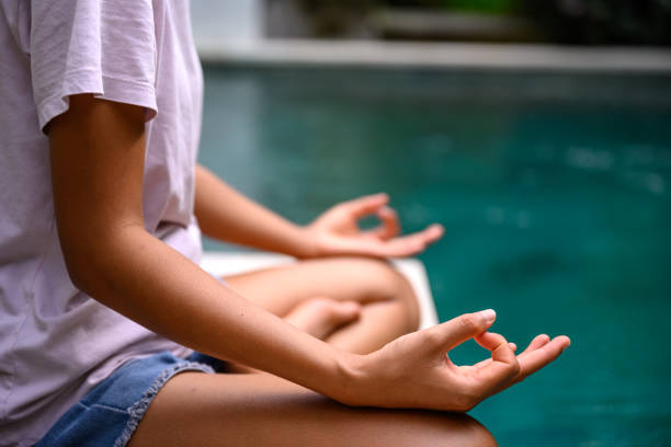 istock Yoga by the pool 1397589243