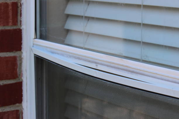 istock Damaged aluminum frame around the window screen due to hail storm 1397590467