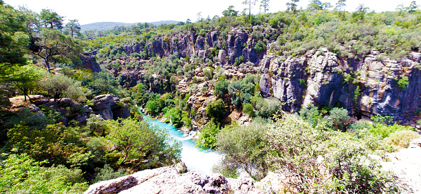 The canyon is located near the town of Side near the city of Antalya. A stormy river runs below