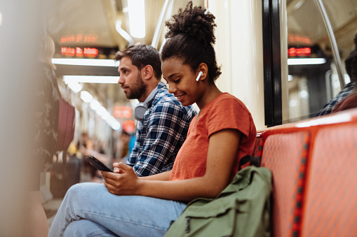 People using public transportation for commuting and transport from one place to another within the city