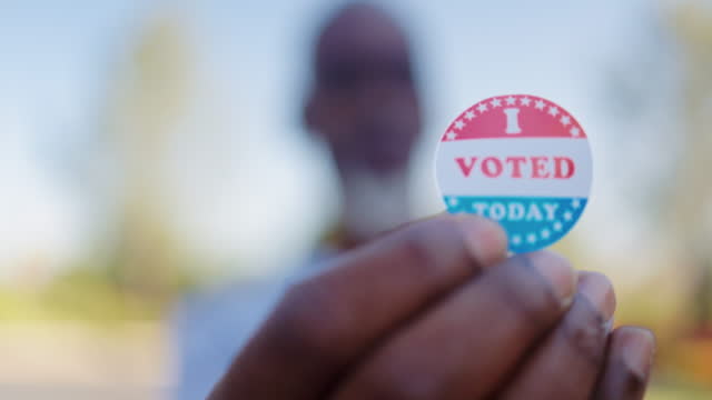 Older Black Man with I Voted Sticker
