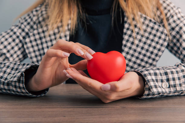 istock woman holding red heart 1397594222