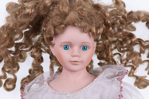 portrait of a vintage doll girl