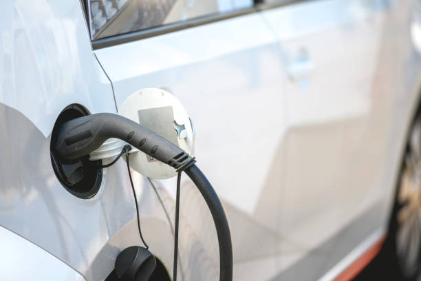 istock Charging of electric car 1397595684