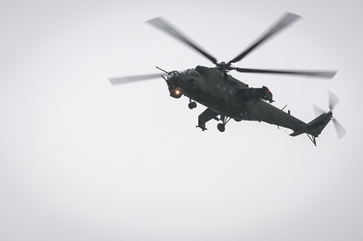 military helicopter hovering