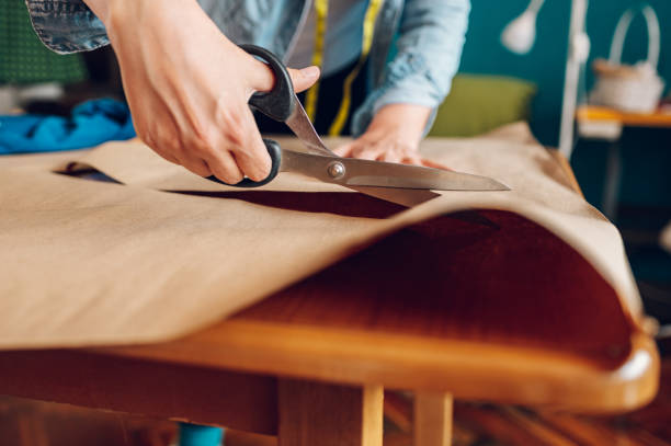 istock Woman tailor working from home and tailoring beautiful clothes 1397598551