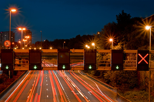 Long exposure highway light cars passing signal light
