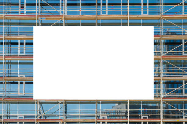 istock Advertising billboard mock-up mounted on the scaffolding 1397605448