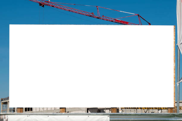 istock Blank white advertising billboard on the construction site 1397605559