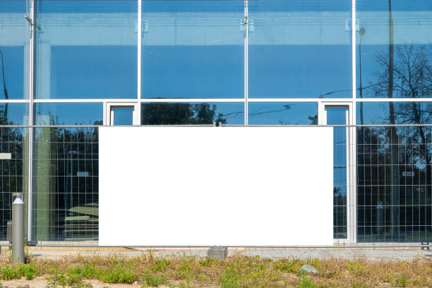 istock Blank white banner for advertisement on the fence of construction site 1397605572