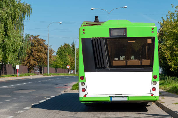 istock Modern green and white bus with blank white space for advertisement 1397605614