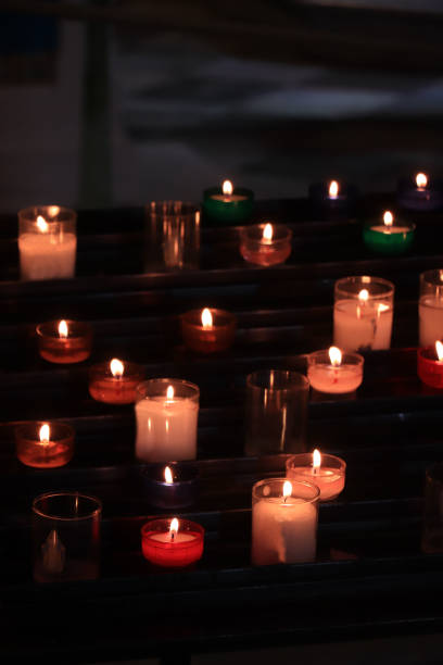 istock Votive candles in a church 1397605740