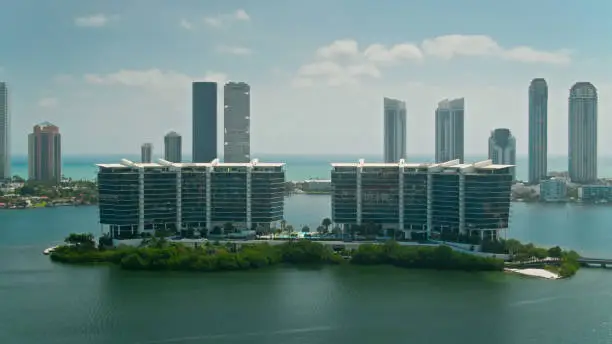 Aerial view of modern condo towers in Aventura, Florida on a bright sunny day