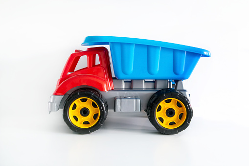 Colorful truck toy isolated on white background with copy space, toys for children, kids.