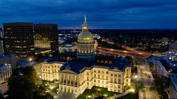 Drone Shot of Georgia State Capitol in Atlanta, Georgia Aerial shot of Georgia State Capitol in Atlanta, Georgia during pre- dawn twilight.

Authorization was obtained from the FAA for this operation in restricted airspace. georgia us state photos stock pictures, royalty-free photos & images