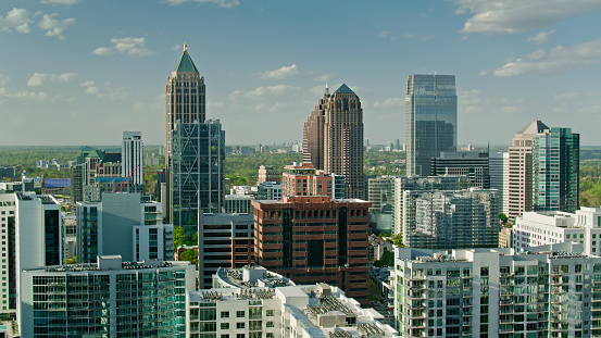 Aerial shot of Midtown skyscrapers in Atlanta, Georgia on a clear sunny spring day.

Authorization was obtained from the FAA for this operation in restricted airspace.