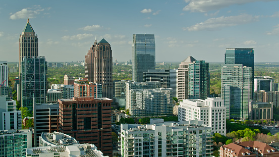 Aerial shot of Midtown skyscrapers in Atlanta, Georgia on a clear sunny spring day.

Authorization was obtained from the FAA for this operation in restricted airspace.