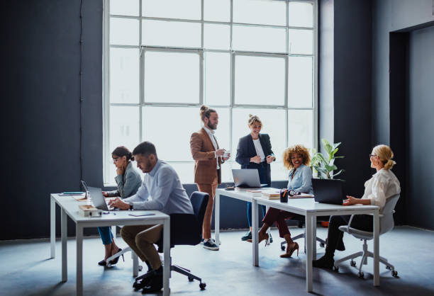 istock Businesspeople Working Together In A Modern Office 1397610395