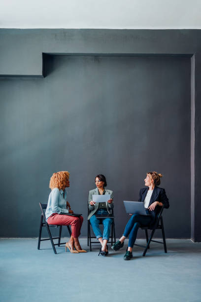 istock Group of Businesspeople Analyzing Business Graphs and Documents Together 1397610410