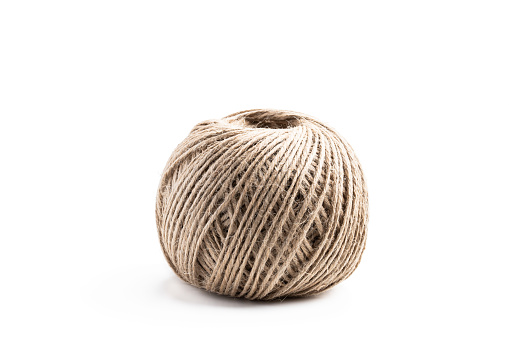 Rolled  jute twine isolated on white