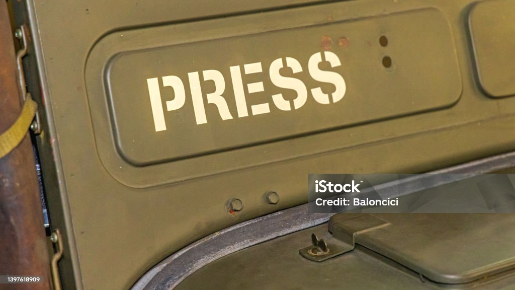 Stencil Press Sign Stencil Press Sign at Green Journalist Vehicle 2022 Stock Photo