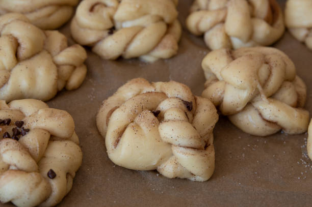 istock Homemade cinnamon and chocolate buns before baking. macro photography. selective focus 1397624028