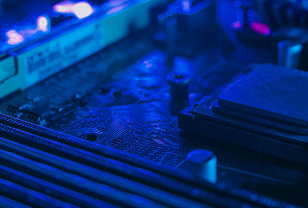 computer mainboard. electronic technology background. toned blue. macro shot.