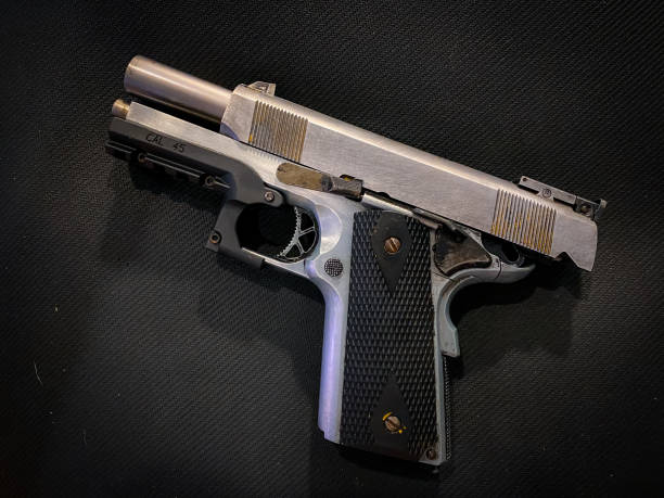 istock Old and dirty pistol gun 1397631368
