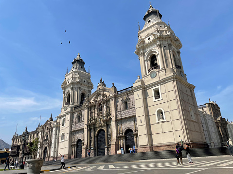 The Metropolitan Cathedral Basilica of Lima and Primate of Peru, dedicated to the Apostle and Evangelist Saint John, is the most important Catholic church in Peru and is located in the historic center of Lima. It is the seat of the Archbishop of Lima and Primate of Peru. Its first stone was laid by the Spanish conqueror Francisco Pizarro, in 1535.