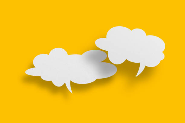 istock White paper in speech bubble shape set against yellow background. 1397632217