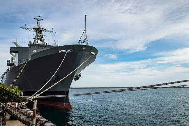 istock Military navy ship in the port 1397634741