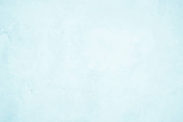 istock Pastel blue and white concrete stone texture for background in summer wallpaper. Cement and sand wall of tone vintage. Concrete abstract wall of light cyan color, cement texture mint green for design. 1397638091
