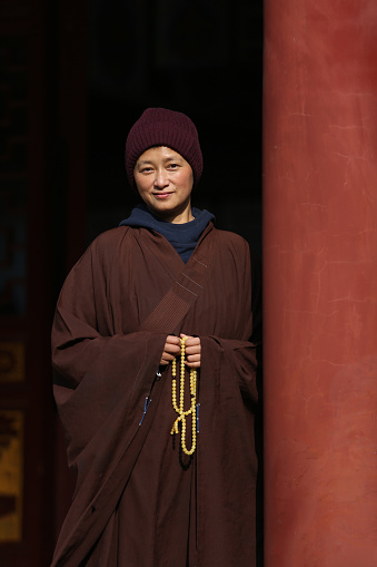 A Chinese Nun in a temple
